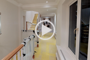 Play button on a large house thumbnail 360 virtual tour made with Matterport